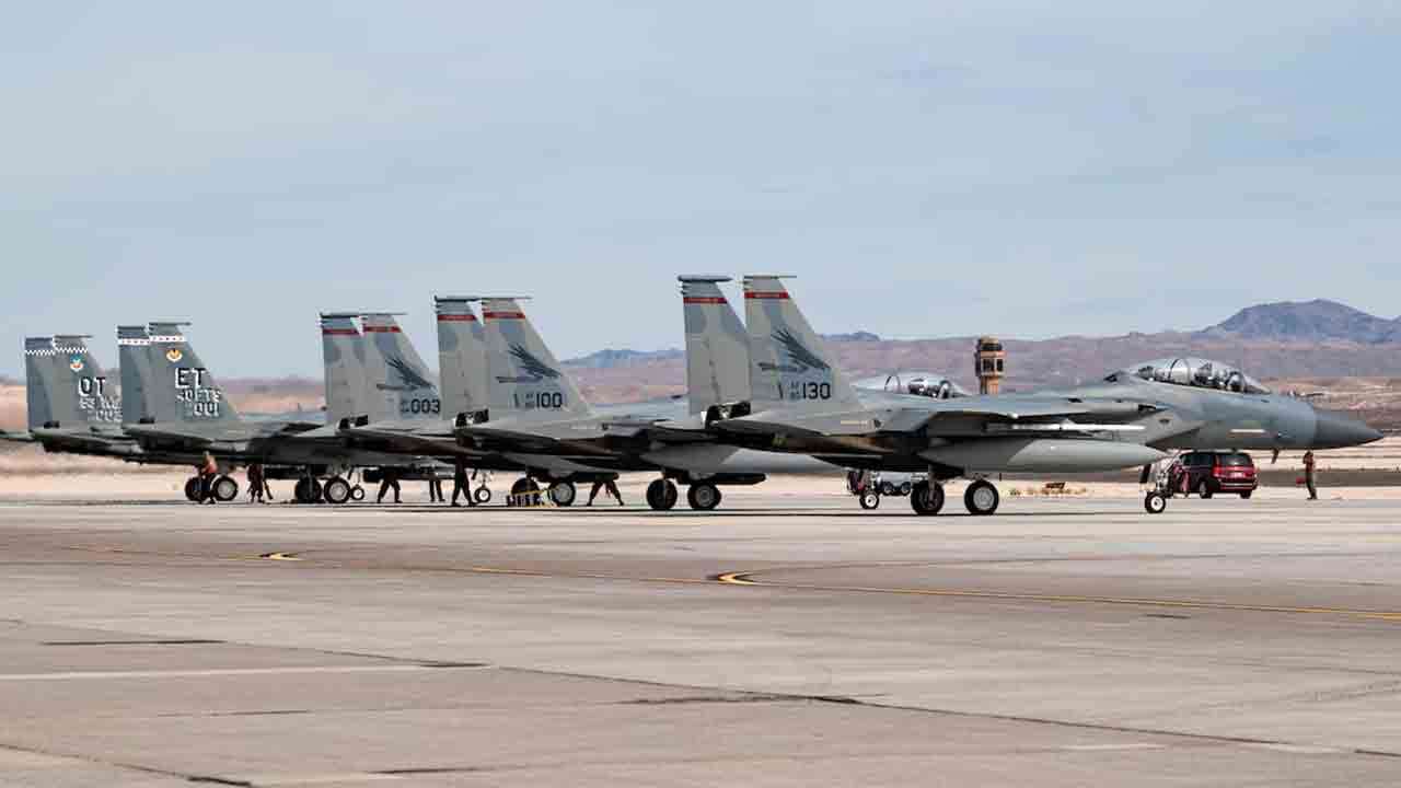 Three F-15C Eagle fighter jets assigned to the 123rd Fighter Squadron, Portland Air National Guard Base, Oregon, and both of the Air Force’s F-15EX aircraft from the 53rd Wing, Eglin Air Force Base, Florida, wait to take off for a mission at Nellis Air Force Base, Nevada, Oct. 20, 2021. The aircraft will conduct the Initial Operational Test and Evaluation from Oct. 18-25, 2021 (U.S. Air Force photo by William R. Lewis)